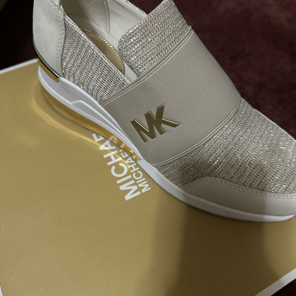 Gold and white wedge shoe